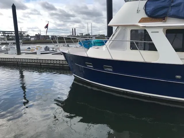 Slide: The Image of Pacific Seacraft 38T Fast Trawler, 2000 model, docked at marina. - 7