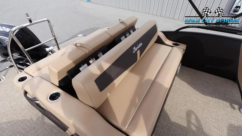 Slide: The Image of 2025 Barletta Cabrio 22UC boat interior with beige seating and cup holders. - 15