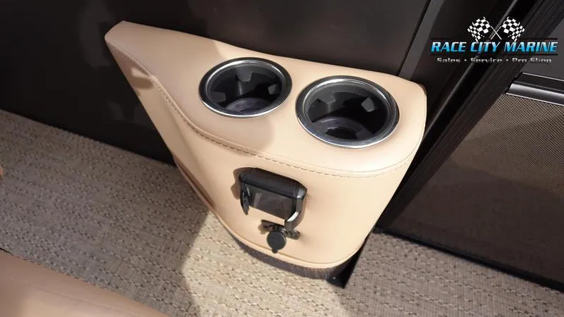 Slide: The Image of Barletta Cabrio 22UC 2025 boat cup holders with beige upholstery and Race City Marine logo. - 20