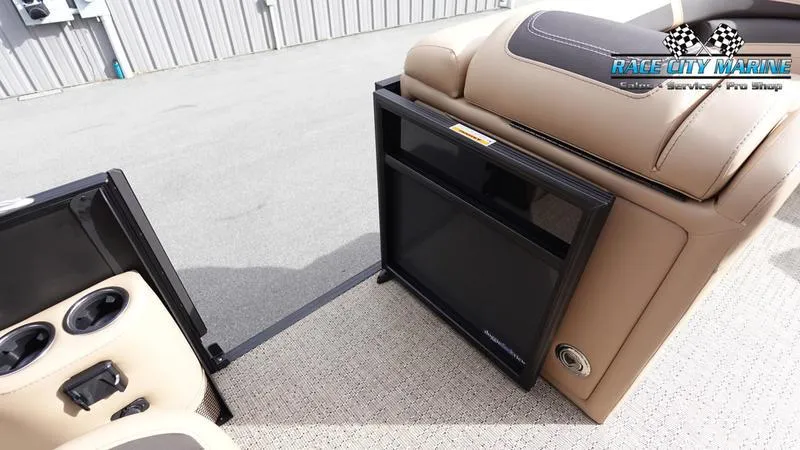 Slide: The Image of 2025 Barletta Cabrio 22UC boat interior with beige seating and cup holders. - 22