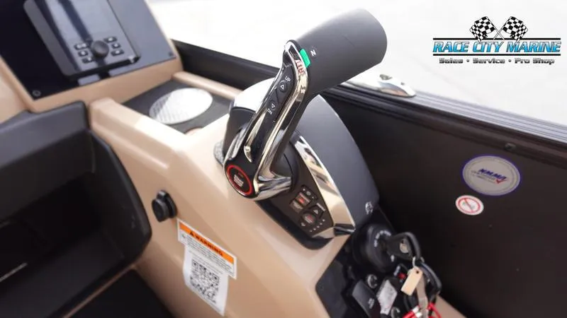 Slide: The Image of 2025 Barletta Cabrio 22UC boat control panel with throttle and key ignition. - 28