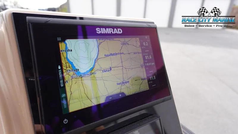 Slide: The Image of Simrad navigation display on 2025 Barletta Cabrio 22UC boat, showing a detailed map. - 31