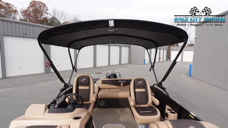 Slide: The Image of 2025 Barletta Cabrio 22UC pontoon boat with spacious seating and canopy in storage area. - 47