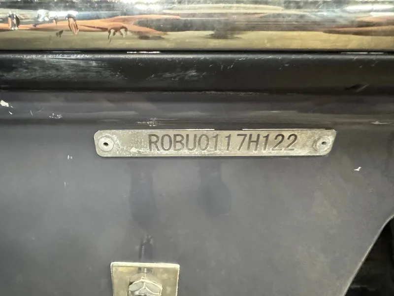 Slide: The Image of 2022 Robalo R230 Center Console boat identification plate with serial number. - 1