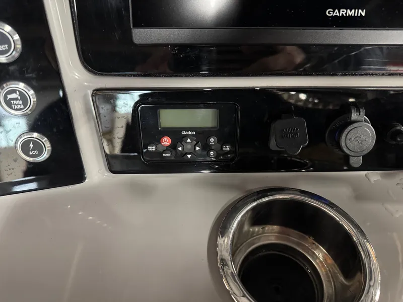 Slide: The Image of 2022 Robalo R230 Center Console dashboard with Garmin display and controls. - 12