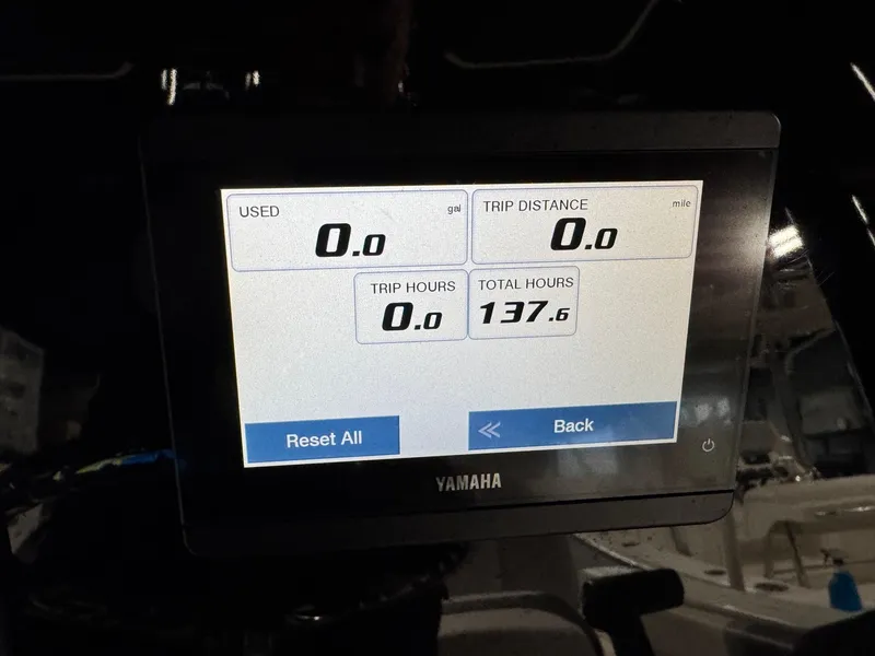 Slide: The Image of Yamaha display on 2022 Robalo R230 Center Console showing trip and total hours. - 29