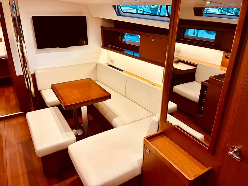 Slide: The Image of Luxurious interior of 2017 Beneteau Oceanis 45 yacht with elegant seating and modern amenities. - 11