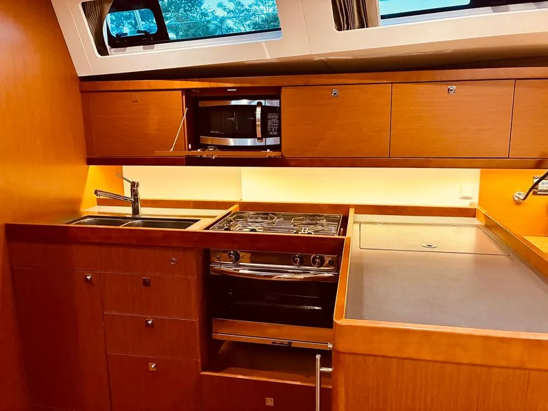 Slide: The Image of Luxurious kitchen interior of 2017 Beneteau Oceanis 45 yacht with modern appliances. - 13