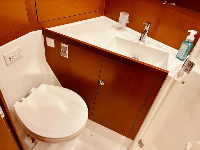Slide: The Image of Bathroom interior of 2017 Beneteau Oceanis 45 yacht with sink and toilet. - 28