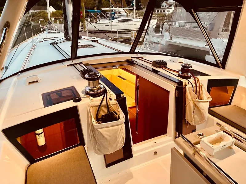 Slide: The Image of Beneteau Oceanis 45 yacht cockpit, 2017 model, featuring winches and open cabin entrance. - 37