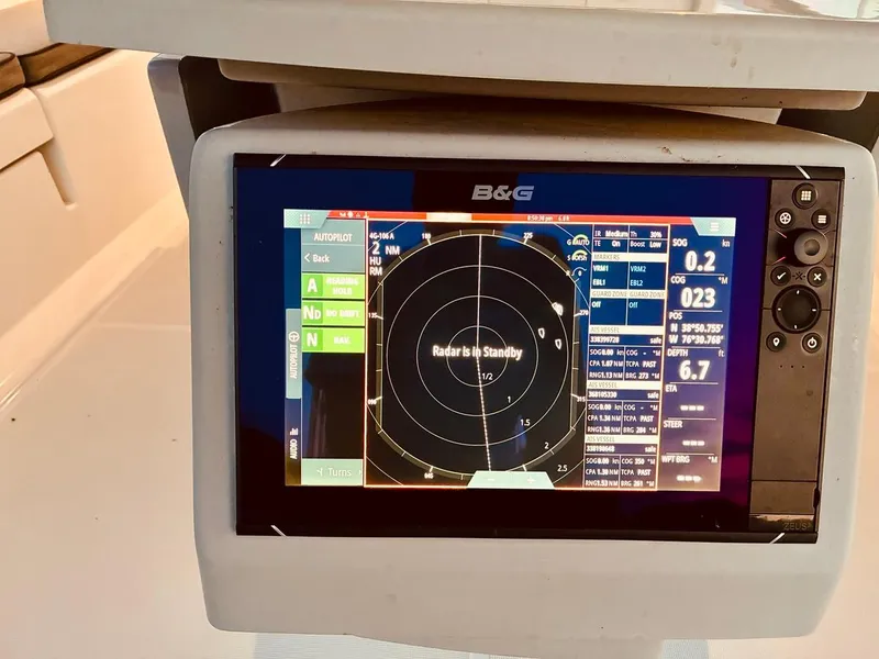 Slide: The Image of B&G navigation display on 2017 Beneteau Oceanis 45 sailboat, showing radar and autopilot settings. - 43