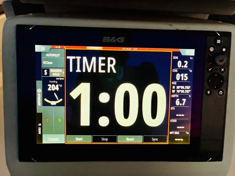 Slide: The Image of B&G navigation display on 2017 Beneteau Oceanis 45, showing timer and sailing data. - 45