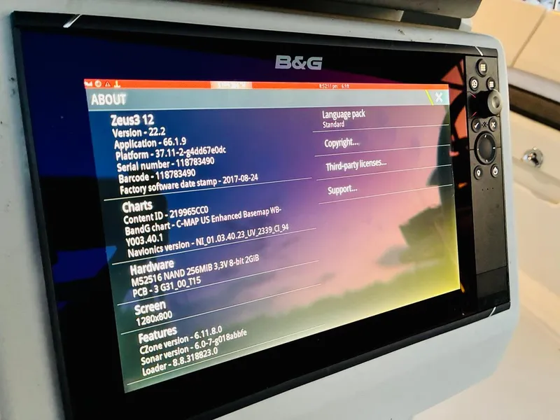 Slide: The Image of B&G Zeus3 12 marine display on 2017 Beneteau Oceanis 45 sailboat, showing system information. - 47