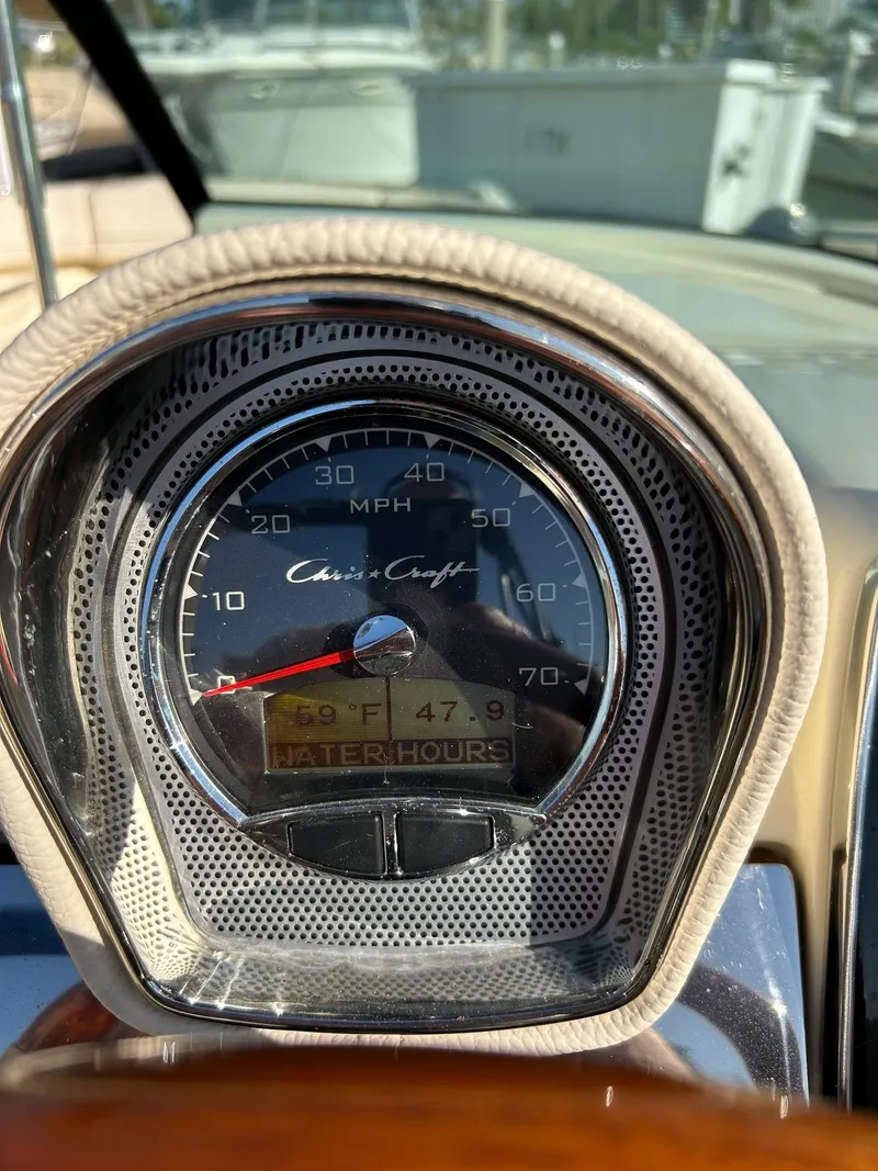 Slide: The Image of Close-up of 2020 Chris-Craft 25 Launch GT speedometer, displaying 47.9 water hours. - 5