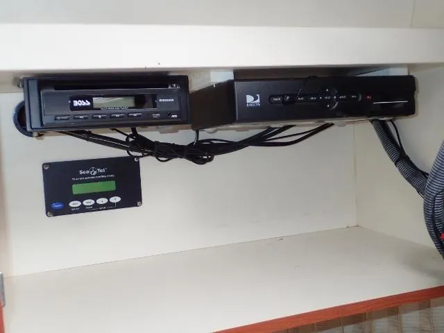 Slide: The Image of 2007 Formula 34 PC cabin electronics with Boss audio and DirecTV receiver. - 21