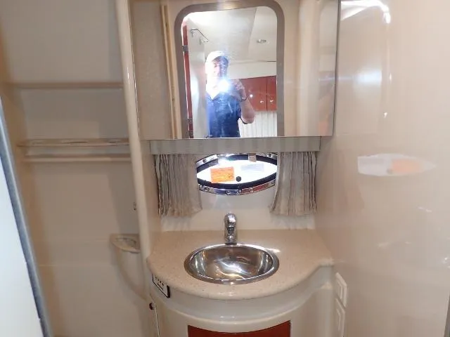 Slide: The Image of Bathroom interior of 2007 Formula 34 PC yacht with sink and mirror. - 22