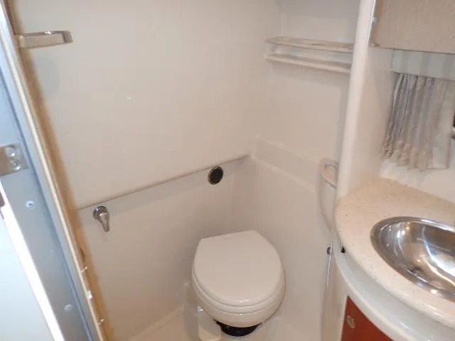 Slide: The Image of 2007 Formula 34 PC yacht bathroom with toilet and sink. - 23