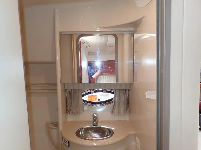 Slide: The Image of 2007 Formula 34 PC yacht bathroom with sink and mirror. - 24