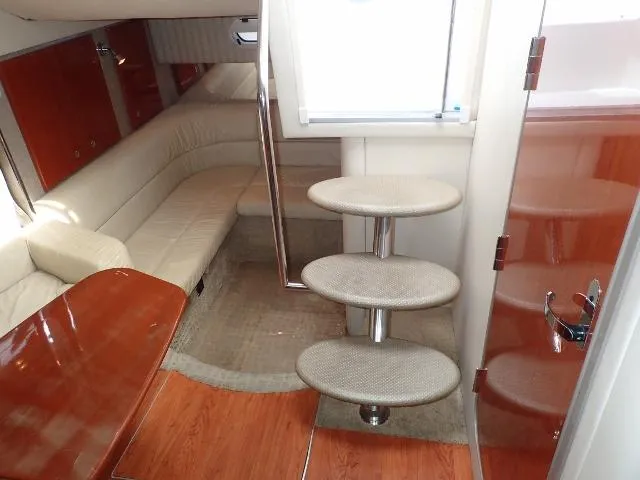 Slide: The Image of 2007 Formula 34 PC yacht interior with modern seating and wooden accents. - 26