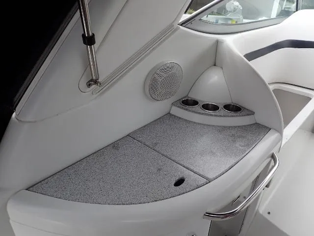 Slide: The Image of 2007 Formula 34 PC boat interior with cup holders and speaker. - 28