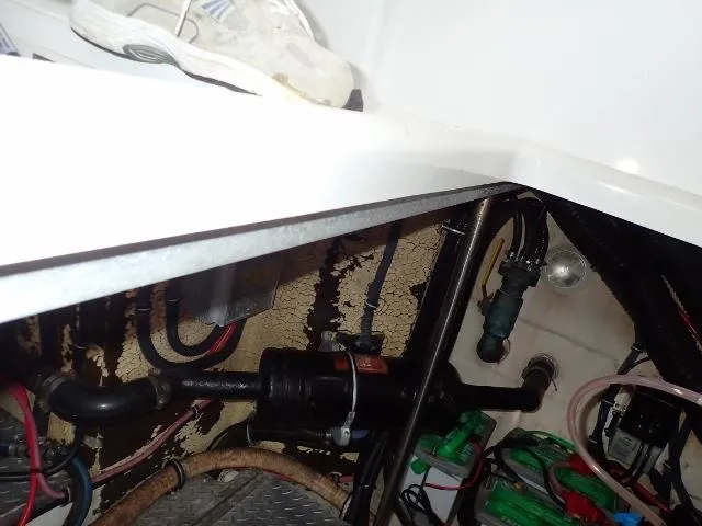 Slide: The Image of Engine compartment of 2007 Formula 34 PC boat with visible wiring and components. - 33