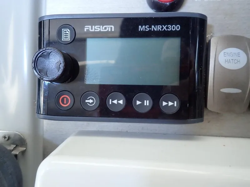 Slide: The Image of Fusion MS-NRX300 marine stereo control on 2007 Formula 34 PC boat. - 47