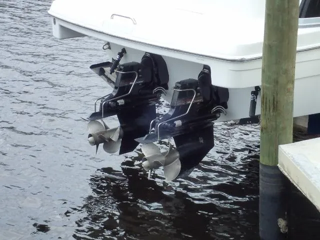 Slide: The Image of 2007 Formula 34 PC boat with dual outboard motors in water. - 5
