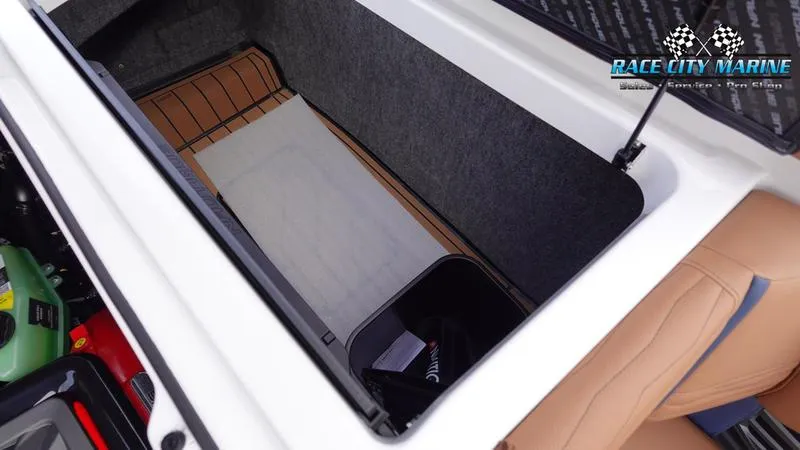 Slide: The Image of Storage compartment of 2025 Nautique Super Air Nautique G25 boat by Race City Marine. - 21
