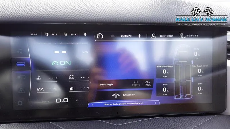 Slide: The Image of Dashboard of 2025 Nautique Super Air Nautique G25 boat with digital controls and display. - 40