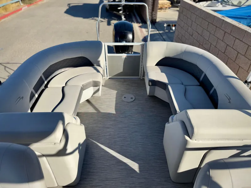 Slide: The Image of 2021 Bennington 23 LSR pontoon boat with spacious seating and modern design. - 14