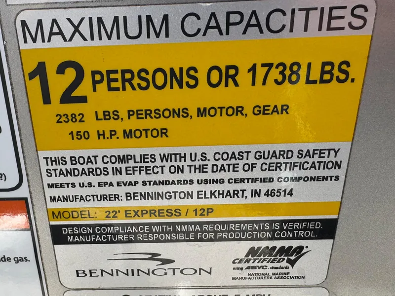 Slide: The Image of Bennington 23 LSR 2021 capacity label: 12 persons or 1738 lbs, 150 HP motor. - 26
