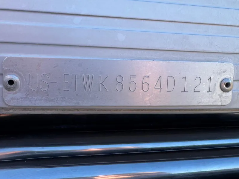 Slide: The Image of Hull identification number on 2021 Bennington 23 LSR boat. - 27