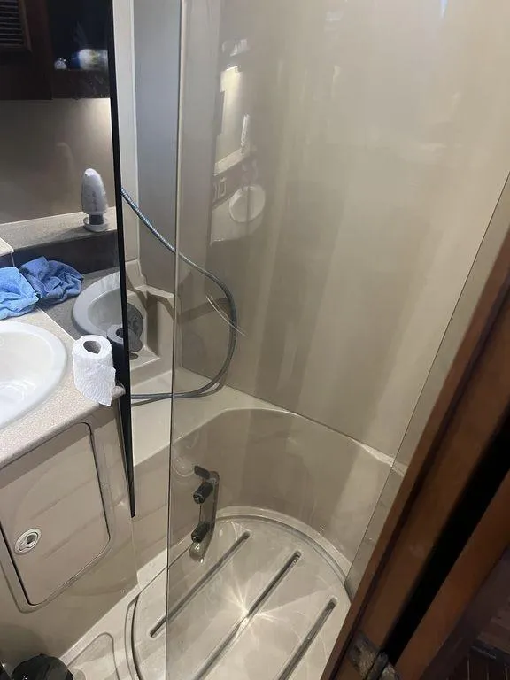 Slide: The Image of Bathroom interior of 2006 Rampage 38 Express yacht with shower and sink. - 16