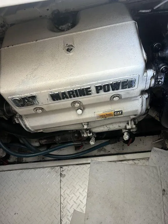Slide: The Image of CAT Marine Power engine in a 2006 Rampage 38 Express boat. - 23