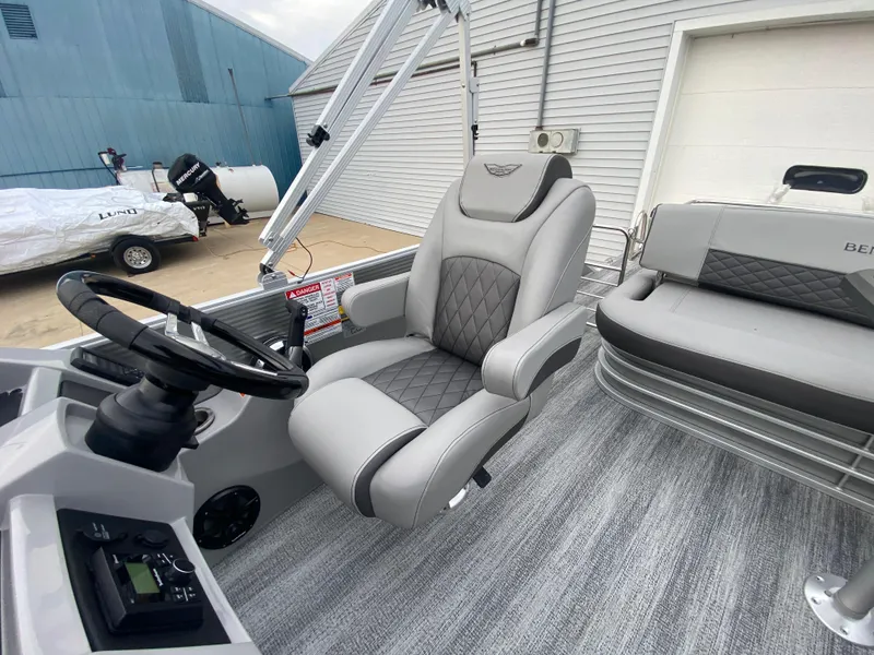 Slide: The Image of 2025 Bennington 23 LSB boat interior with luxurious seating and modern design. - 23