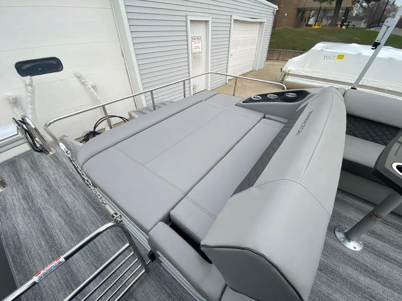 Slide: The Image of 2025 Bennington 23 LSB boat with gray seating and cup holders. - 30