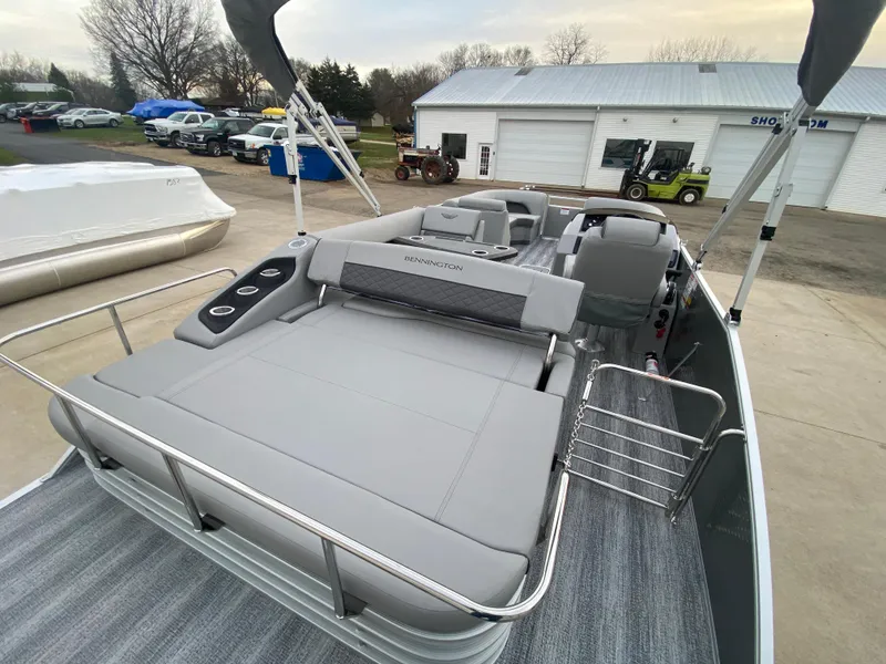 Slide: The Image of 2025 Bennington 23 LSB pontoon boat with spacious seating and modern design. - 32