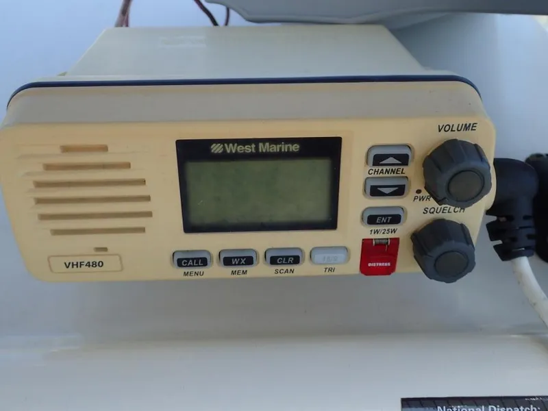 Slide: The Image of West Marine VHF480 radio on 2016 Cobia 217 Center Console boat. - 10