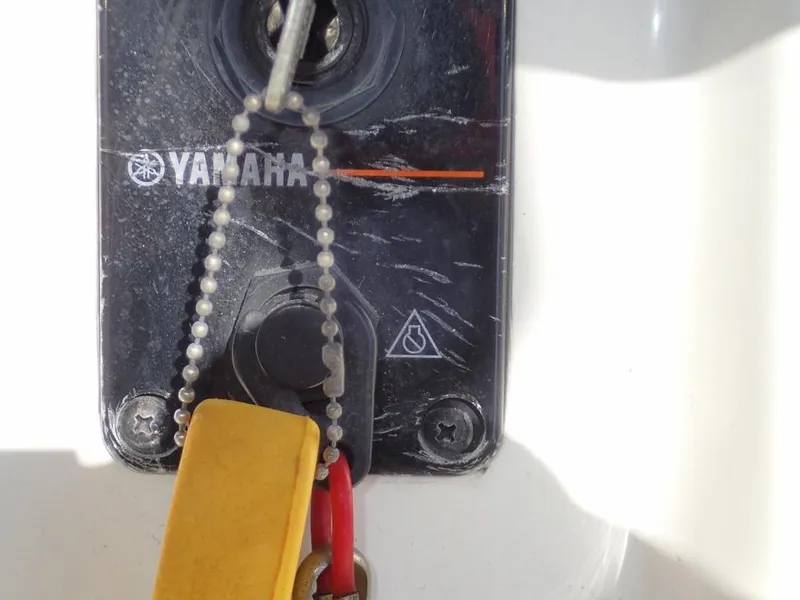 Slide: The Image of Yamaha ignition switch on 2016 Cobia 217 Center Console boat. - 28
