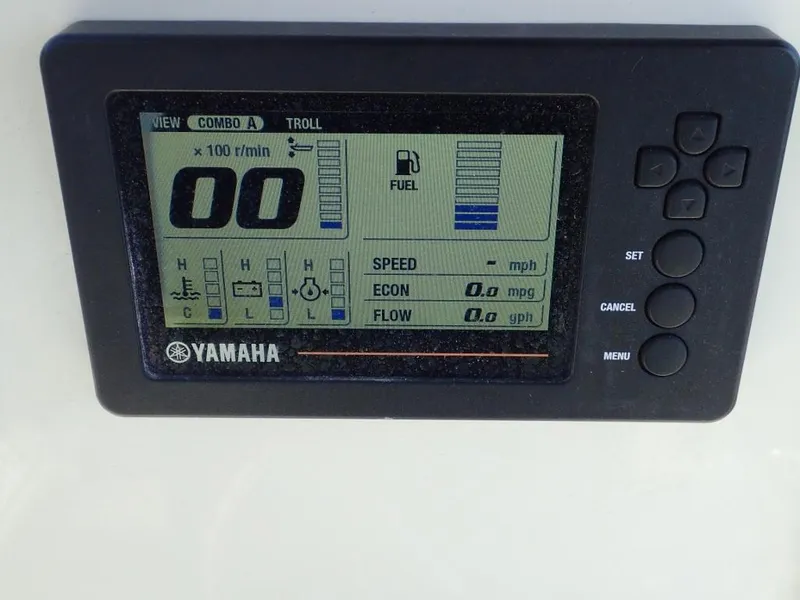 Slide: The Image of Yamaha display on 2016 Cobia 217 Center Console showing fuel and speed metrics. - 5