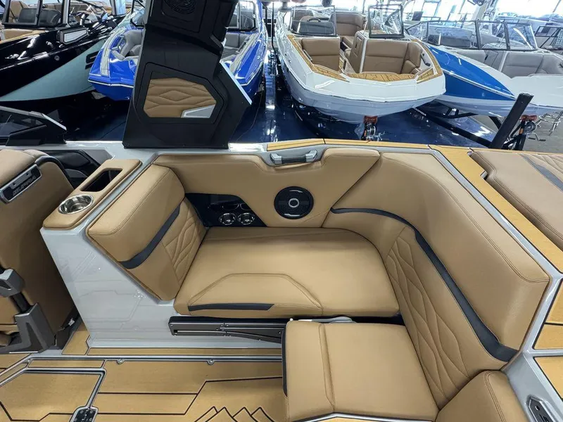 Slide: The Image of Luxurious interior of 2025 Supra SV 400 boat with tan leather seating and modern design. - 13
