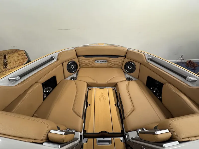 Slide: The Image of Luxurious interior of 2025 Supra SV 400 boat with tan leather seating and modern speakers. - 16