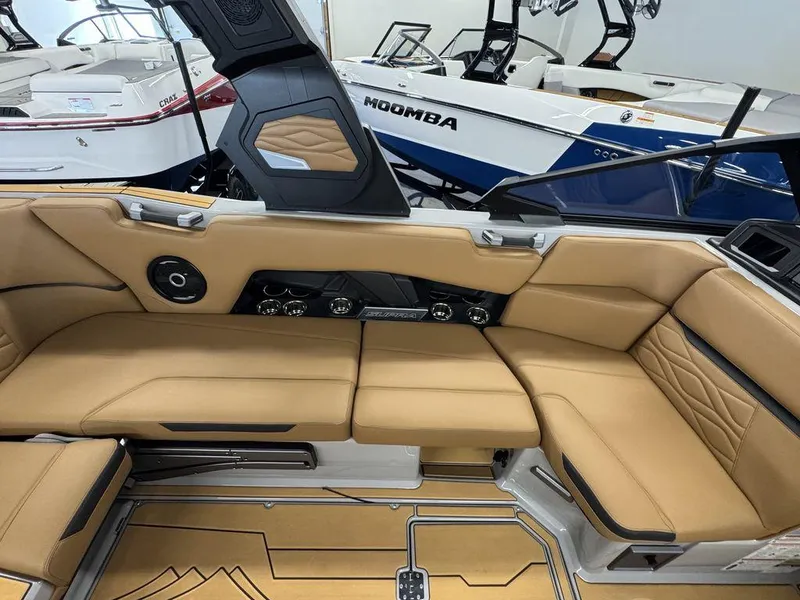 Slide: The Image of Luxurious interior of 2025 Supra SV 400 boat with tan leather seating. - 18