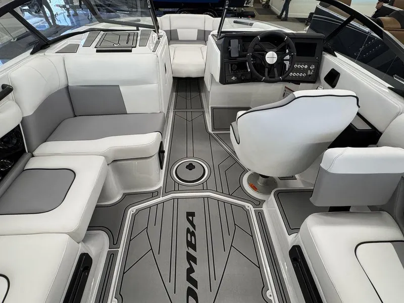 Slide: The Image of 2025 Moomba Craz boat interior with sleek seating and modern dashboard design. - 11