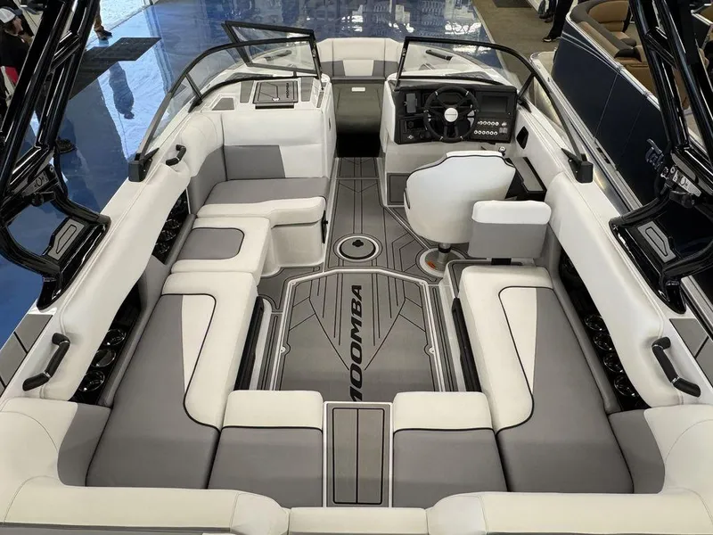 Slide: The Image of 2025 Moomba Craz boat interior with sleek seating and modern dashboard design. - 5