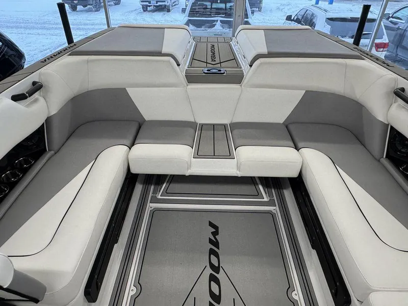 Slide: The Image of 2025 Moomba Craz boat interior with spacious seating and modern design. - 7