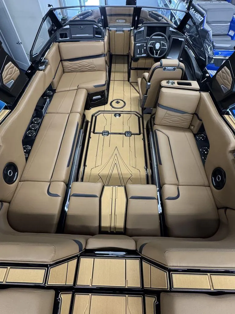 Slide: The Image of Luxurious interior of 2025 Supra SL 450 boat with tan leather seating and modern design. - 12