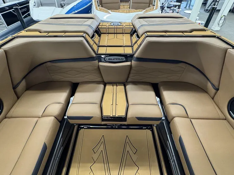 Slide: The Image of Luxurious interior of 2025 Supra SL 450 boat with tan leather seating. - 15