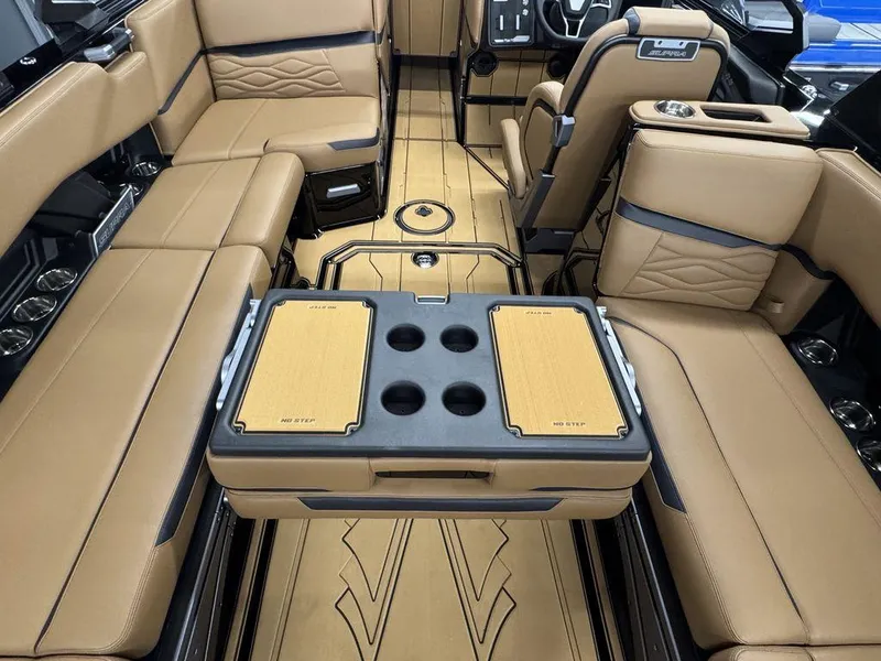 Slide: The Image of Luxurious interior of 2025 Supra SL 450 boat with tan leather seating and modern design. - 17