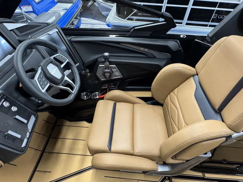 Slide: The Image of 2025 Supra SL 450 interior with tan leather seat and modern steering wheel design. - 29